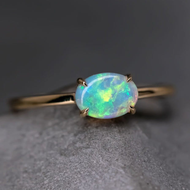 18K Yellow Gold Engagement Ring featuring an Oval Australian Solid Opal