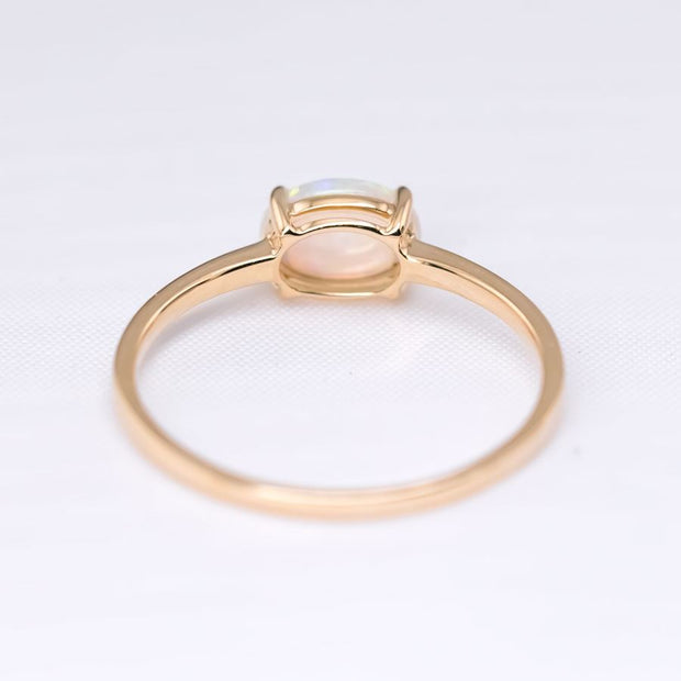 18K Yellow Gold Engagement Ring featuring an Oval Australian Solid Opal