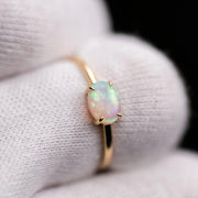18K Yellow Gold Engagement Ring featuring an Oval Australian Solid Opal
