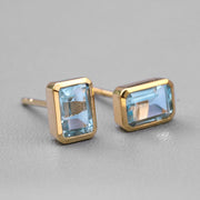 Blue Topaz Stud Earrings 14K Yellow Gold Emerald Cut