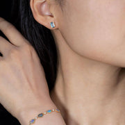 Blue Topaz Stud Earrings 14K Yellow Gold Emerald Cut