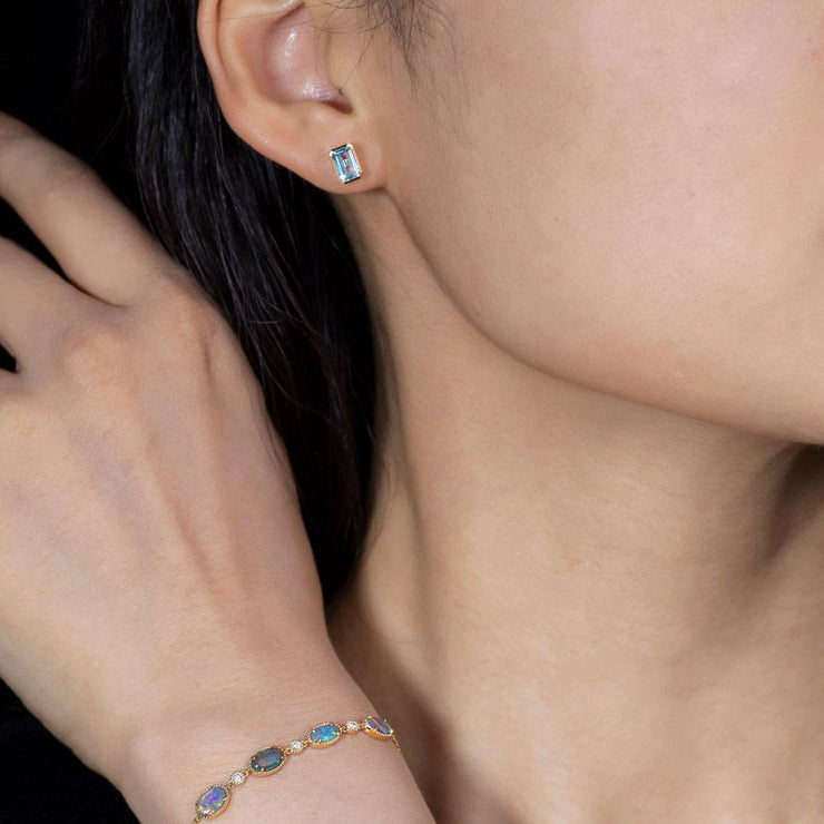 Blue Topaz Stud Earrings 14K Yellow Gold Emerald Cut